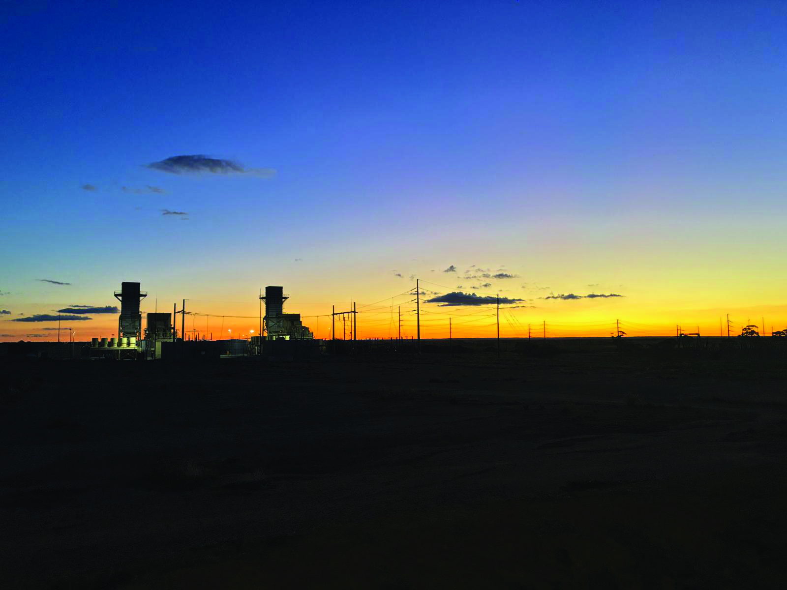 High-voltage site at sunset